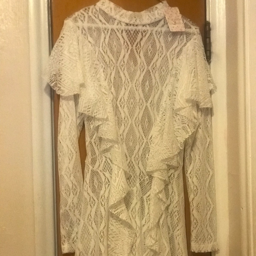 Free people lace dress w/ ruffle details.